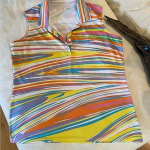 Antigua sleeveless golf or tennis shirt with collar. Size is Large